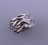 A silver knot ring. Ring size M/N.
