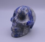 A lapis skull. 6 cm high.