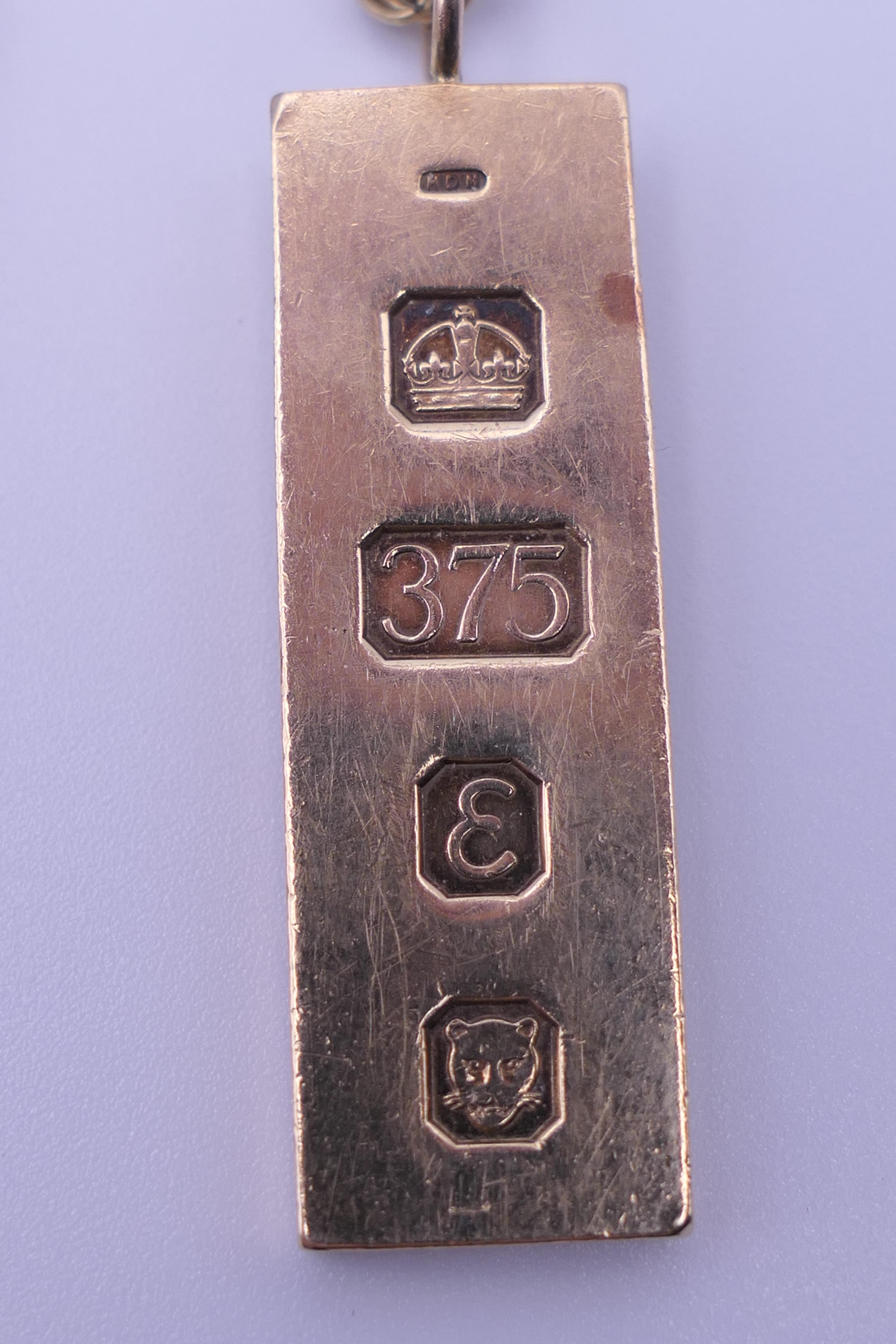 A 9 ct gold ingot on a 9 ct gold chain. 27.1 grammes. - Image 5 of 5