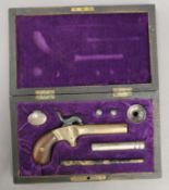 An antique Belgium cased pistol. The case 21 cm wide.
