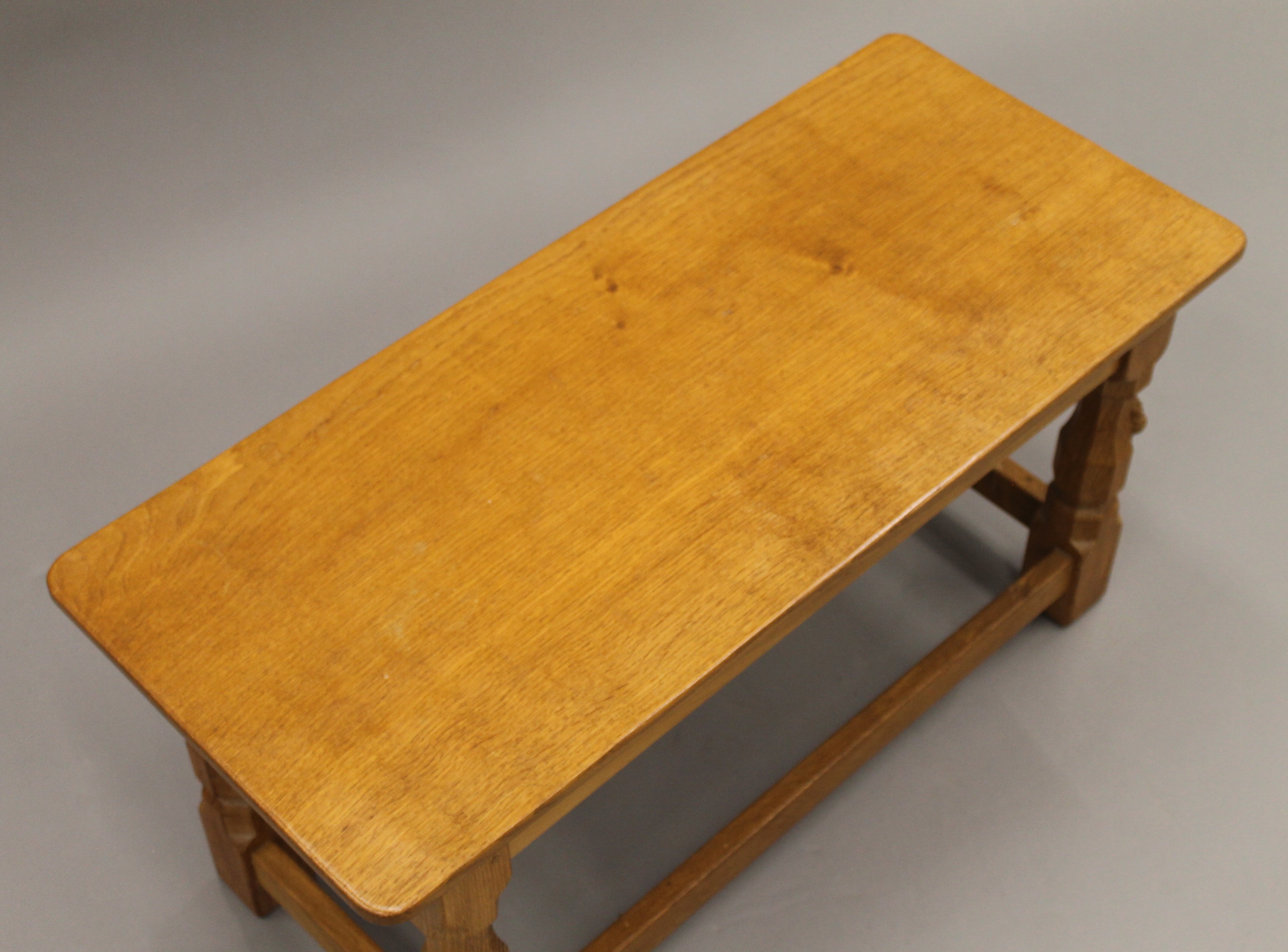 A Robert 'Mouseman' Thompson of Kilburn rectangular adzed oak coffee table. 82 cm long, 35. - Image 6 of 6