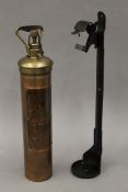 A vintage Nuswift copper and brass fire extinguisher. 41 cm long.