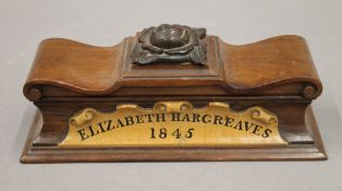 A Victorian walnut desk top pen box, inscribed ''Elizabeth Hargreaves 1845''. 21.5 cm wide.