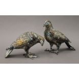 Two patinated white metal models of pigeons. The largest 18.5 cm high.