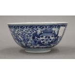A 19th century Chinese blue and white porcelain bowl, the underside with four character mark.