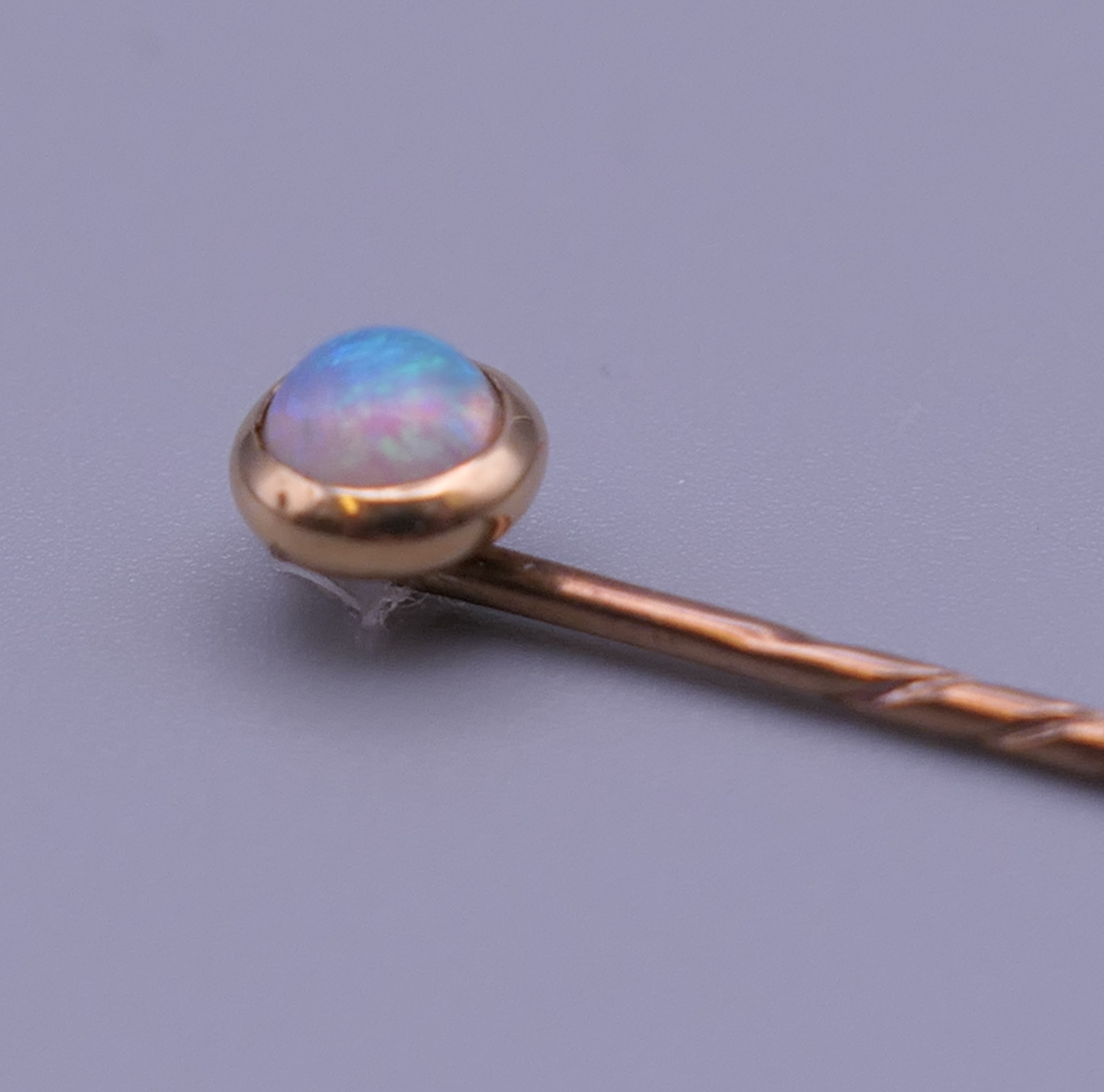 An opal mounted unmarked stickpin, housed in a leather box. 5.5 cm long. - Image 5 of 9