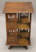 An early 20th century oak revolving bookcase. 65 cm high.