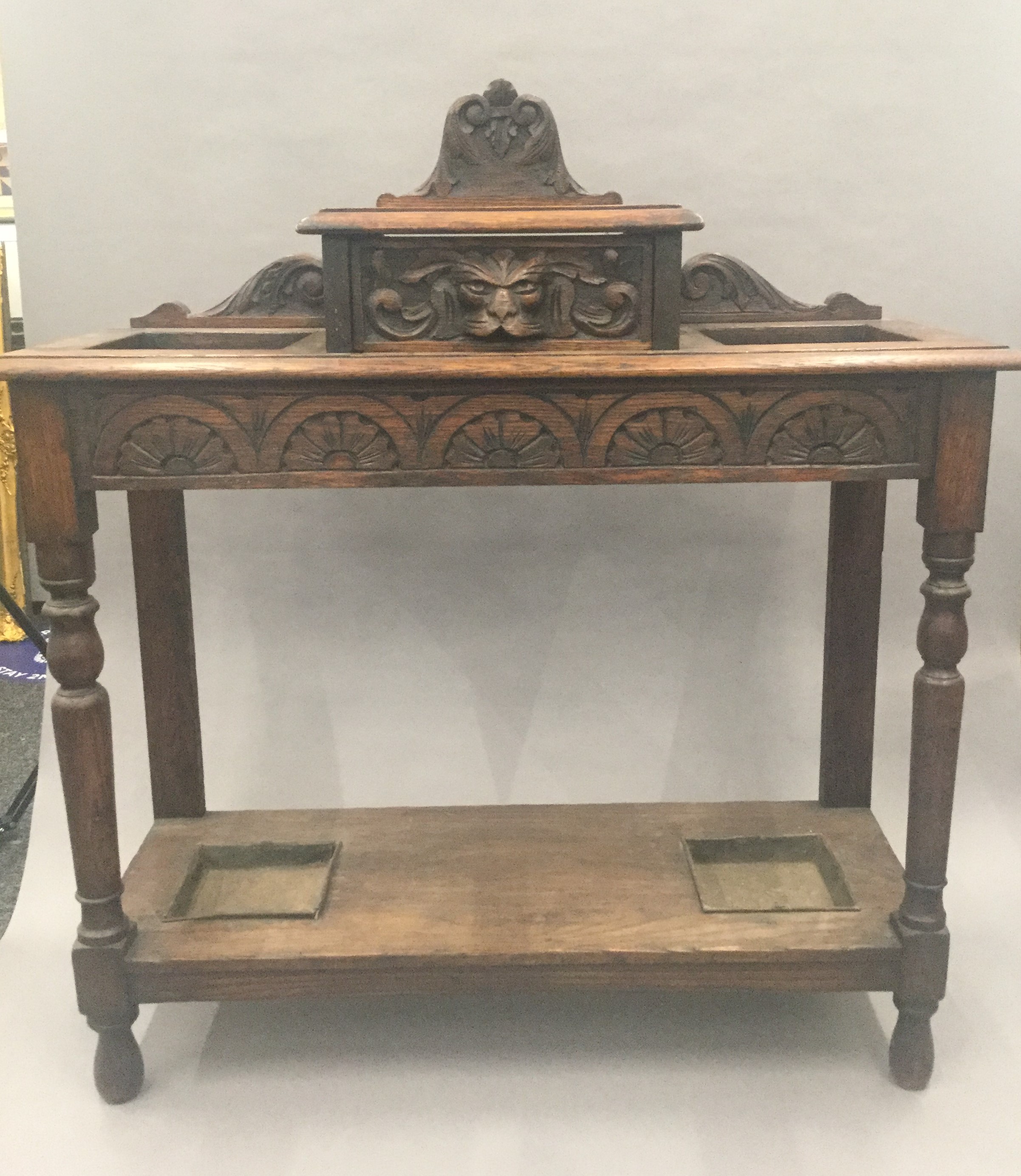 A Victorian carved oak hall stand. 91 cm wide.