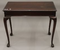 An early 20th century mahogany card table. 91 cm wide.