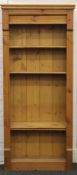 A modern pine bookcase. 86 cm wide x 197 cm high.