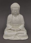 A blanc de chine model of Buddha. 26 cm high.