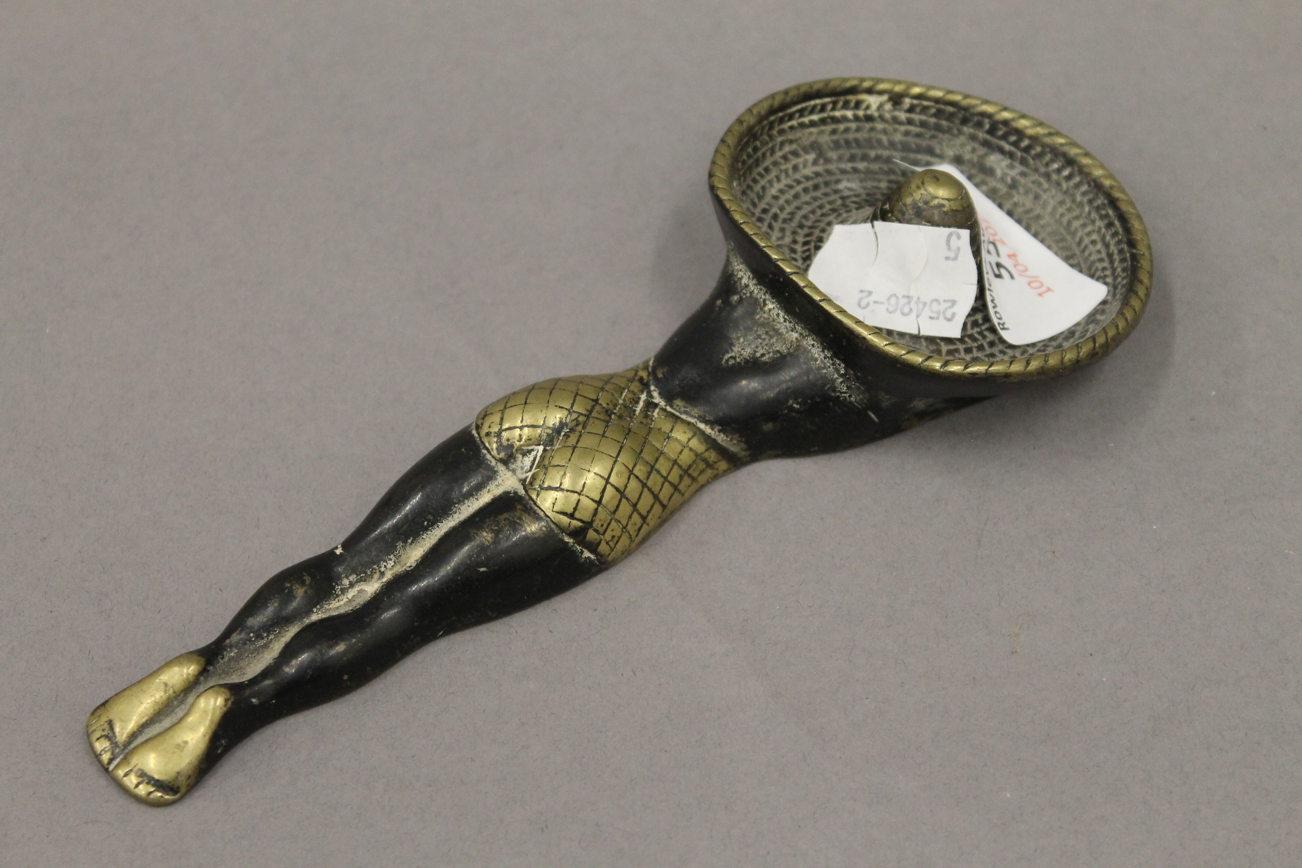 A brass novelty ashtray. 17.5 cm long. - Bild 2 aus 4