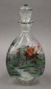 A glass decanter decorated with hunting scenes. 24 cm high.