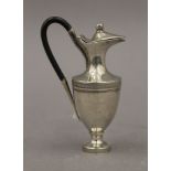 A 19th century French miniature silver ewer. 10.5 cm high. 93.3 grammes total weight.