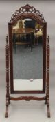 A reproduction cheval mirror. 189 cm high.