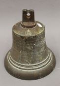 A bronze bell, inscribed ''GRVI''. 25 cm high.