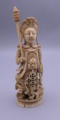 A 19th century Chinese ivory figure, probably a chess piece. 11.5 cm high.