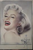 A Marilyn Monroe print on board. 58.5 x 86.5 cm.