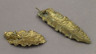 An early 20th century bronze leaf form tray mounted with a rabbit;