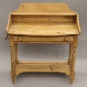 A Victorian pine wash stand.