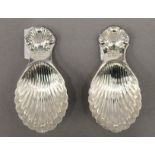 Two silver shell bowl caddy spoons. 8 cm long. 42.7 grammes.
