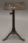 A Victorian cast iron machinists table. 69 cm high.