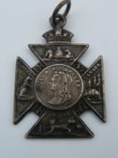 A Queen Victoria medallion. 2.5 cm wide.