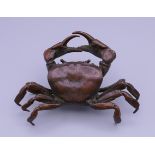 A bronze model of a crab. 10 cm wide.