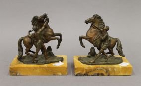 A pair of bronze Marley horses. Each 13.5 cm high.