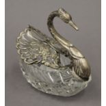 A silver and cut glass swan. 12 cm high.