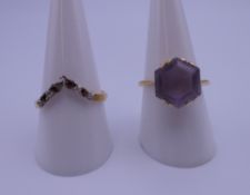 Two 18 ct gold rings. 6.9 grammes total weight.