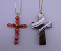 An antique banded agate hardstone cross and a faceted carnelian bead cross on a 925 silver chain.