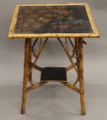 A Victorian lacquered bamboo side table. 57.5 cm square.