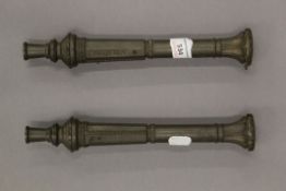 A pair of small scale cast bronze models of canons,