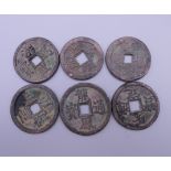 Six Chinese coins.