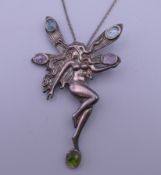 An Ortak 925 silver fairy formed pendant and chain. 6.5 cm high.