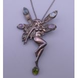 An Ortak 925 silver fairy formed pendant and chain. 6.5 cm high.