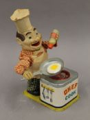 A mid-20th century Japanese Chef Cook battery operated automaton toy. 25 cm high.