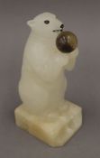 A polar bear form alabaster table lamp. 24 cm high.