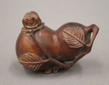 A Chinese wooden snuff bottle. 5.5 cm high.