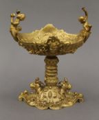 A small gilt bronze tazza. 20 cm high.