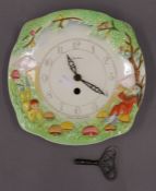 A Royal Winton ''Pixie'' wall clock. 21 cm wide.