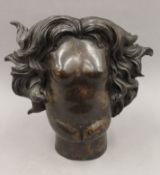 After RENE MAGRITTE (1898-1967) Belgium, The Rape, a patinated bronze. 37 cm high.