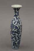 A slender Chinese porcelain blue and white vase. 16 cm high.