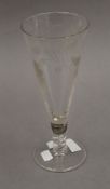 A large 19th century English conical shaped ale glass engraved with roses and 'fiat'. 25.5 cm high.