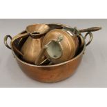 A quantity of copperware, including a large twin handled preserving pan. 53 cm wide.