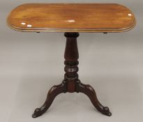 A Victorian mahogany tilt top tripod table. 40 cm wide.