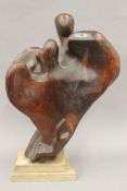 After HENRY MOORE (1898-1986) British, wooden sculpture on a stepped plinth base. 63 cm high.