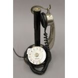 An early 20th century French Thompson-Houston stick desk telephone, reg no 83827. 28.5 cm high.