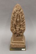 A Cambodian Khamer temple stone carving mounted on a plinth base. 56 cm high.